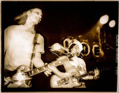 Stage actor under bronze lighting