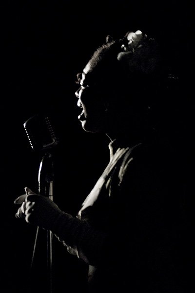 Singer performing on stage