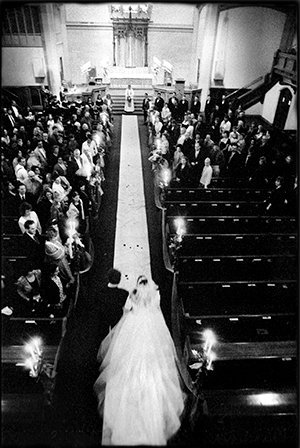 Walking down the aisle.